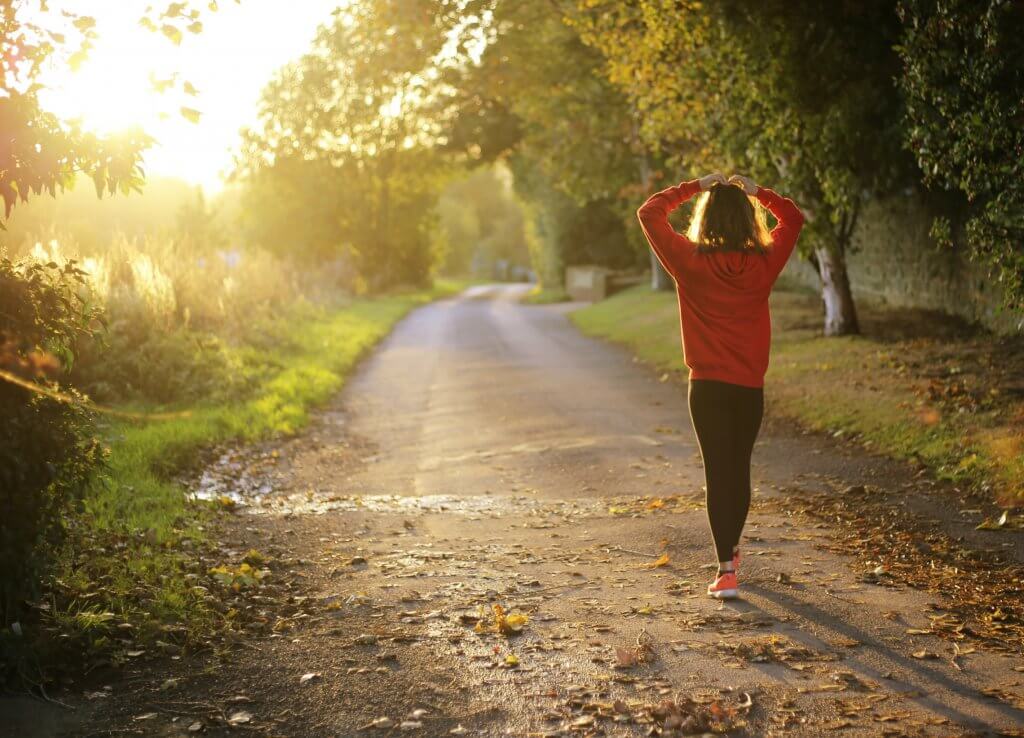 Woman walking outdoors